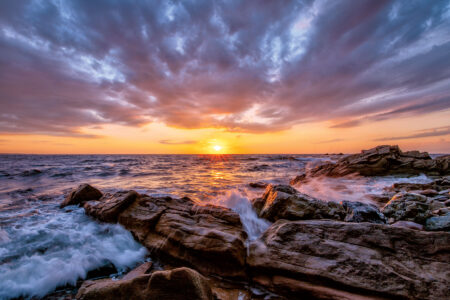 Photos from the Field: Sunset Illuminates Strong Ocean Surf Image